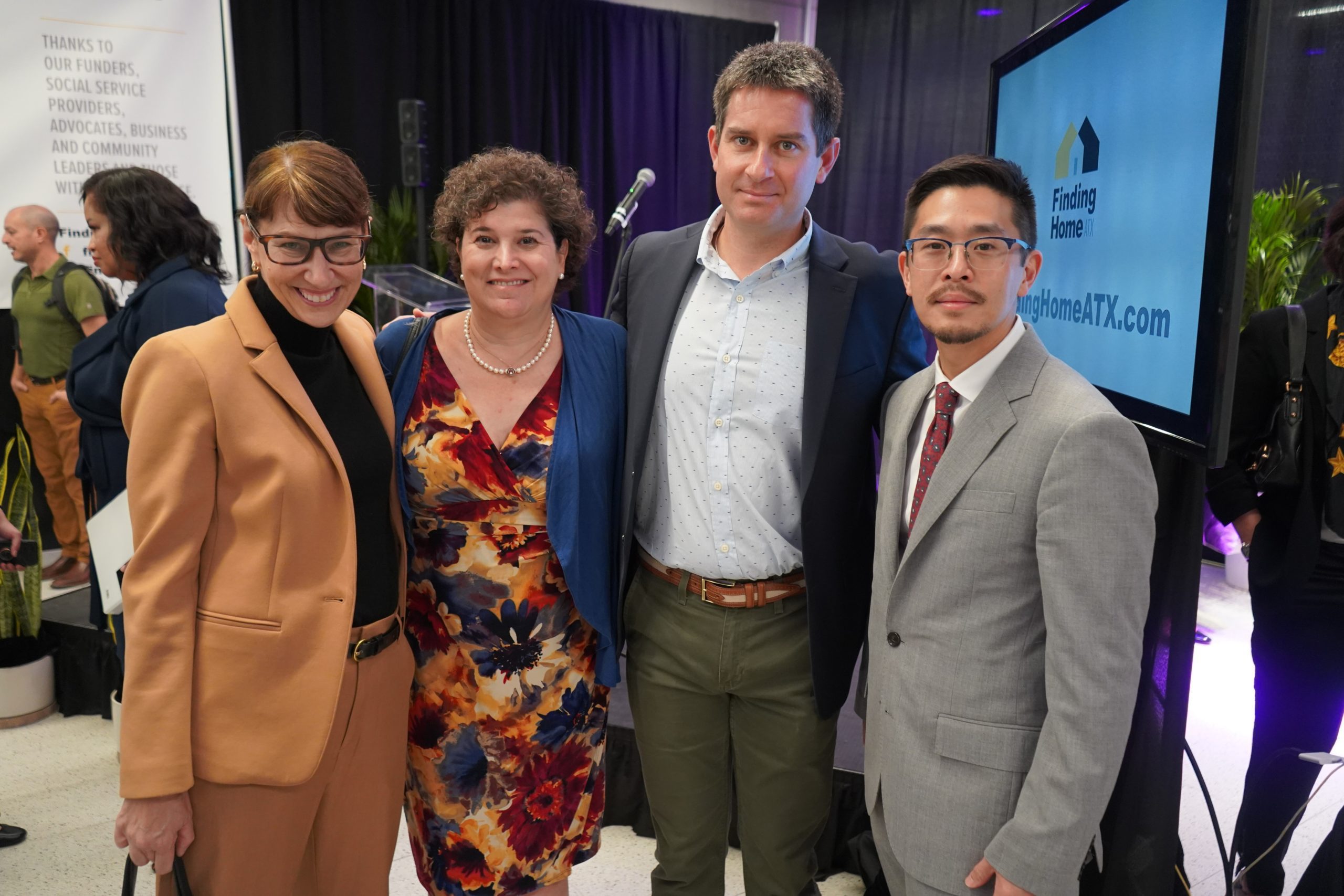 LifeWorks CEO Susan McDowell, Council Member Alison Alter, ECHO Executive Director Matt Mollica, and HUD representative Richard Cho posing shoulder to shoulder