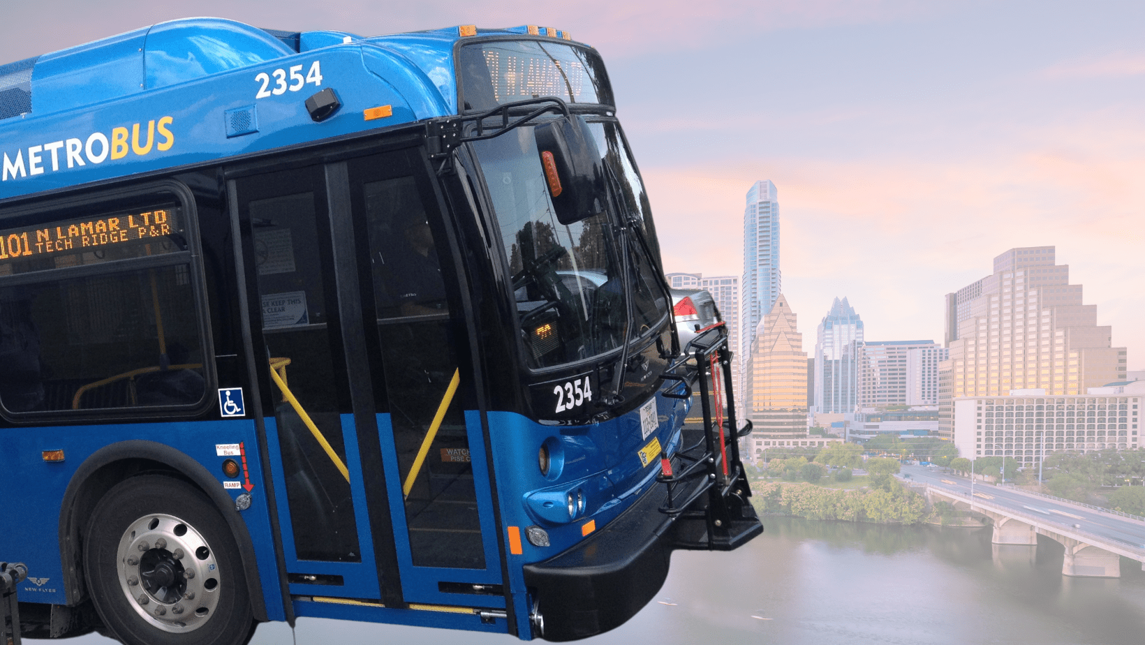 Photo of Capital Metro bus on top of Austin skyline