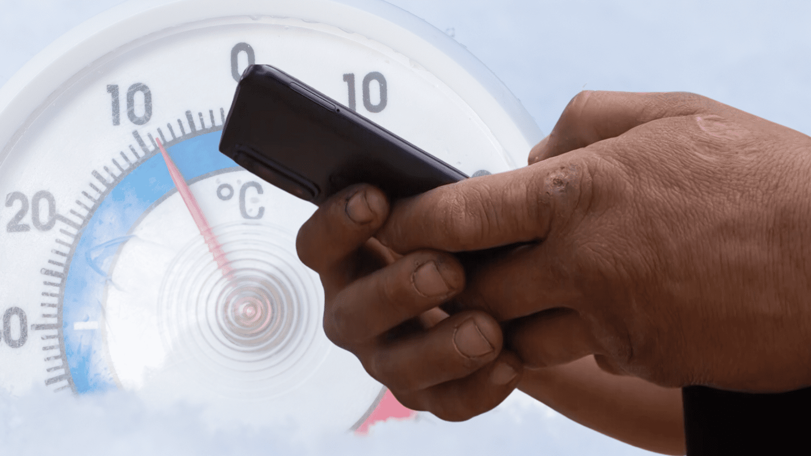 Photo of hands holding cell phone over image of thermometer and ice
