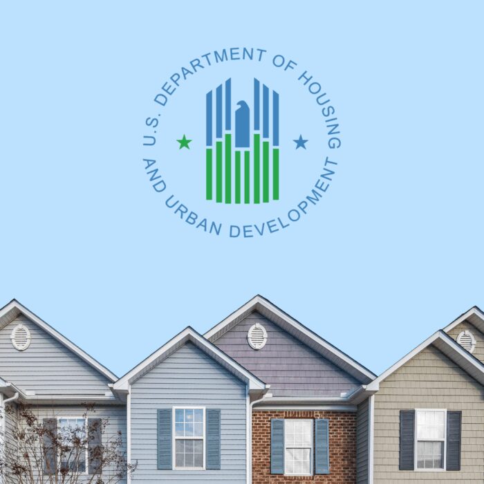 HUD logo in the sky over a photo of rooftops