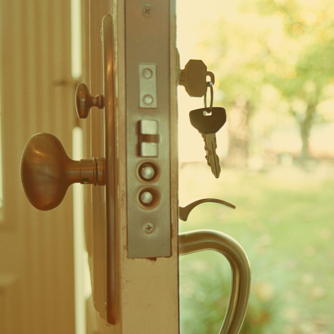 Photo of open front door looking into the yard