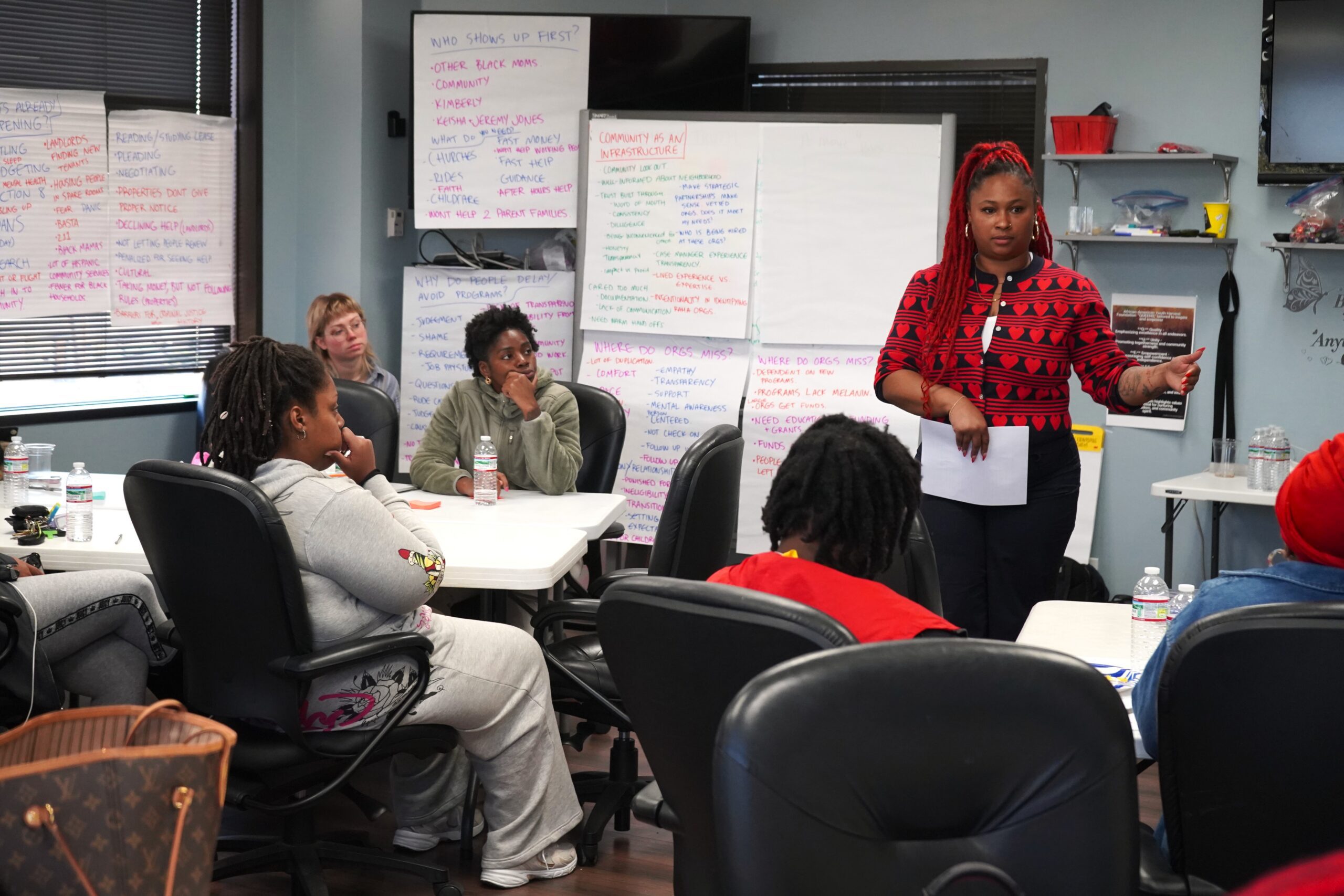 Ashleigh Hamilton, ECHO's Right at Home program manager, hosts a community feedback session